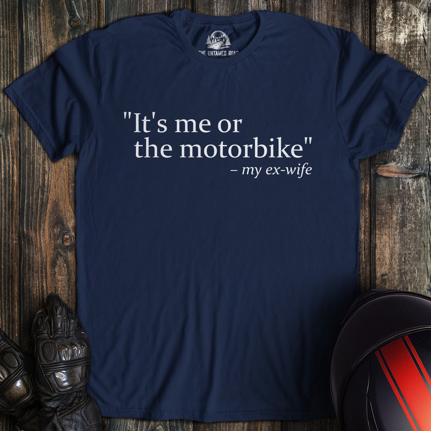 A navy colored t-shirt with the words "me or motorbike" printed on the front.