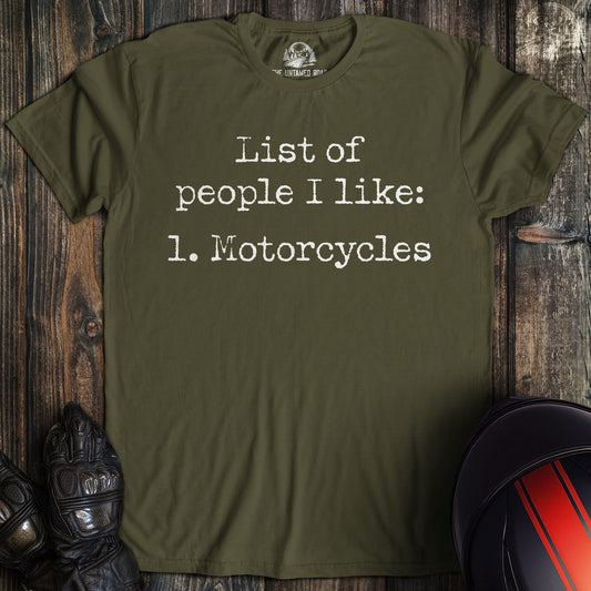 A military green colored t-shirt with the words "list of people ilike" printed on the front.