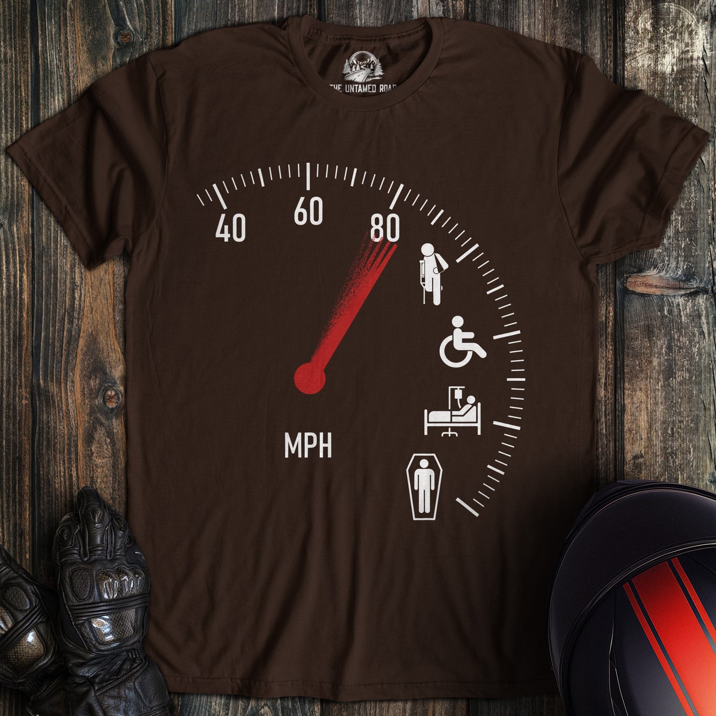A dark chocolate colored t-shirt with the words "injury speedometer" printed on the front.
