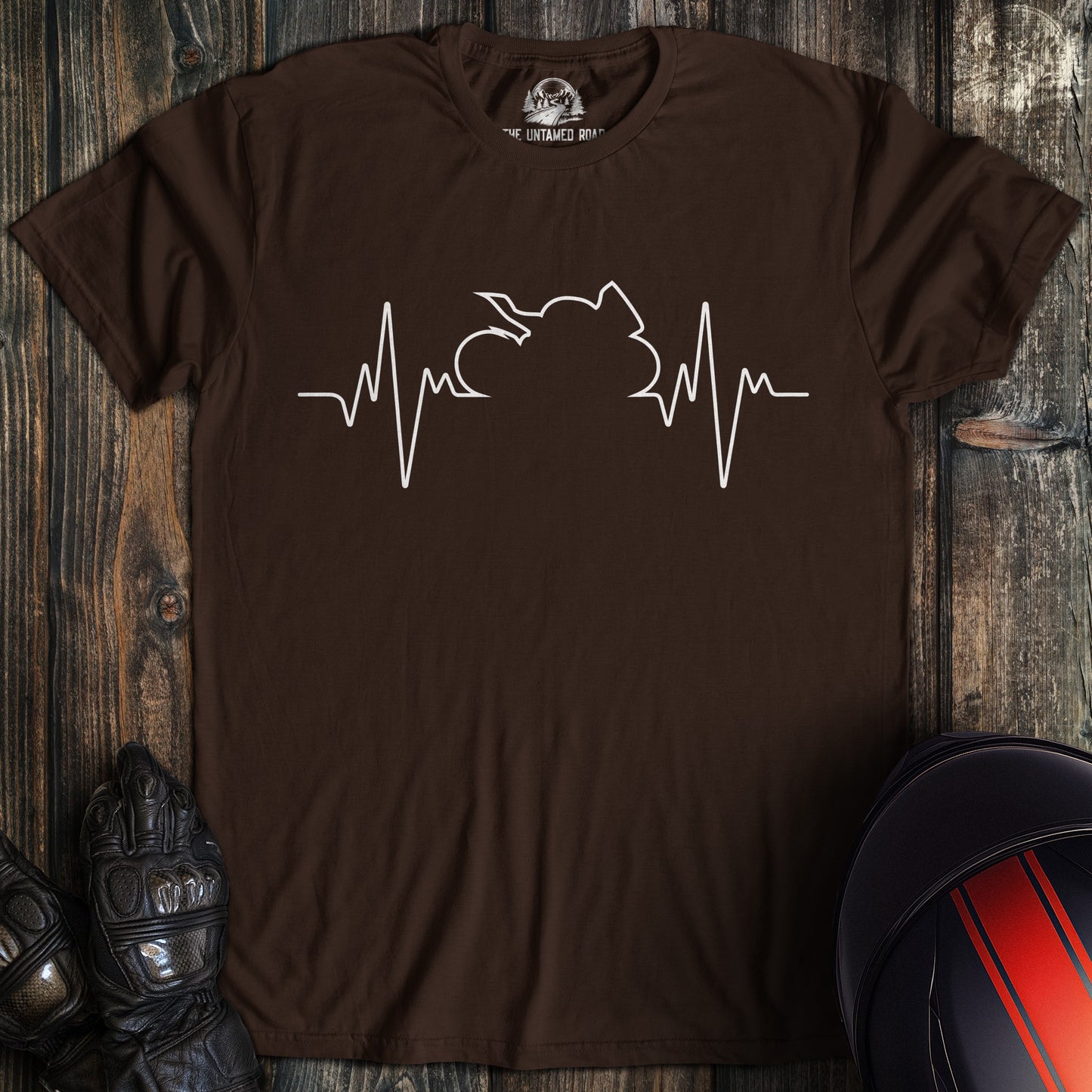 A dark chocolate colored t-shirt with the words "sportbike heartbeat" printed on the front.