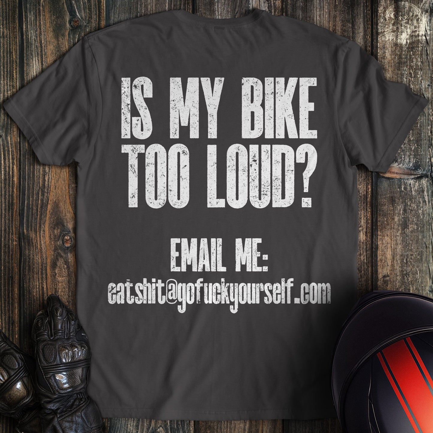 A charcoal colored t-shirt with the words "loud bike complaint" printed on the back.