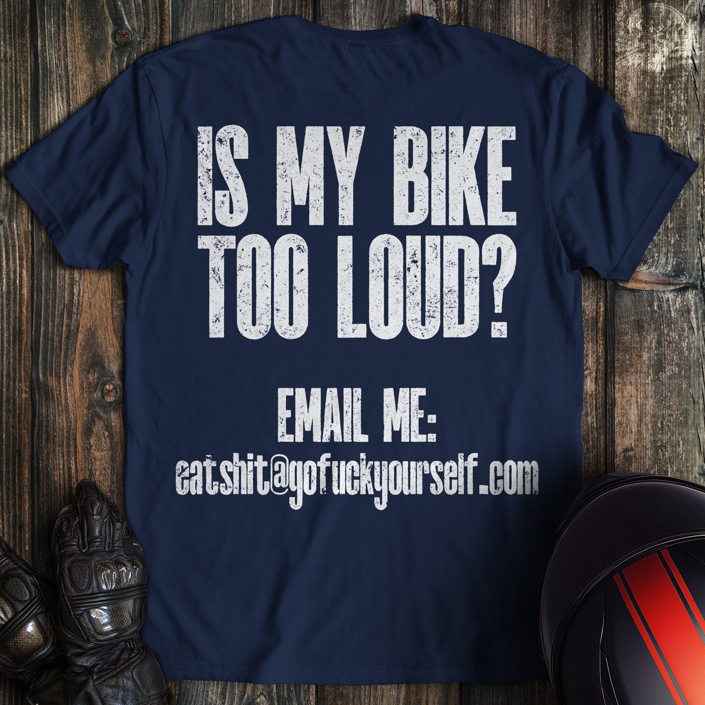 A navy colored t-shirt with the words "loud bike complaint" printed on the back.
