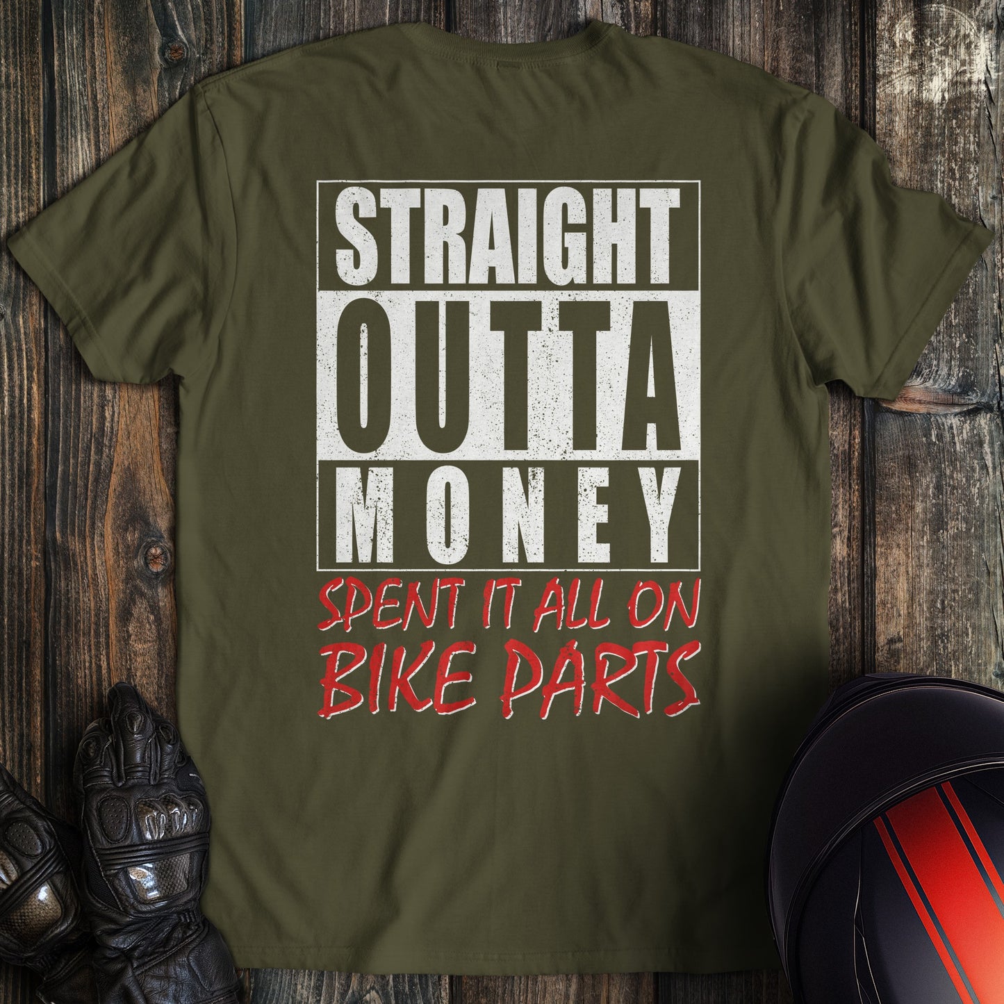 A military green colored t-shirt with the words "straight outta money 2" printed on the back.