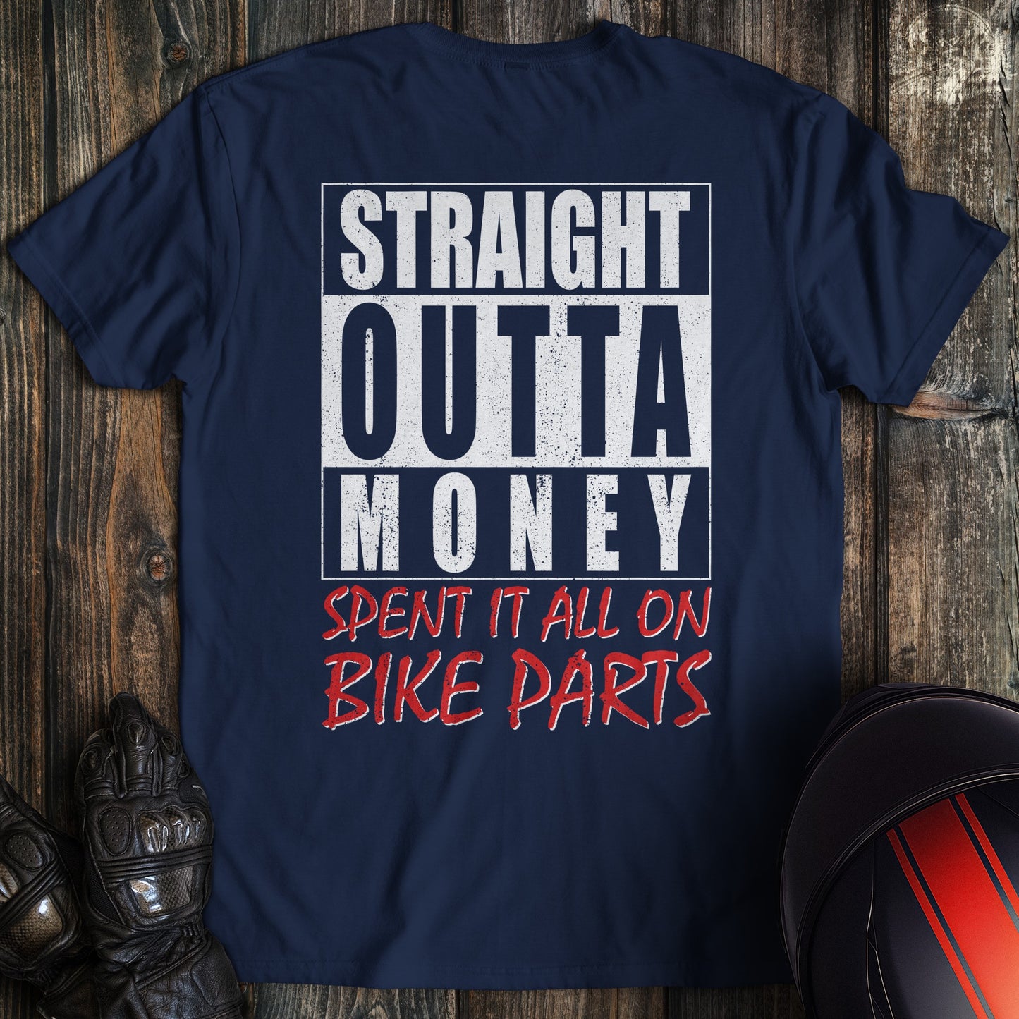 A navy colored t-shirt with the words "straight outta money 2" printed on the back.