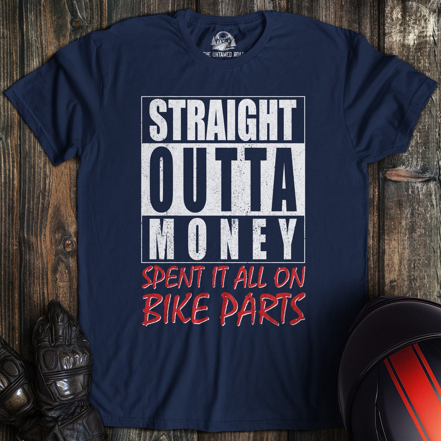 A navy colored t-shirt with the words "straight outta money 2" printed on the front.