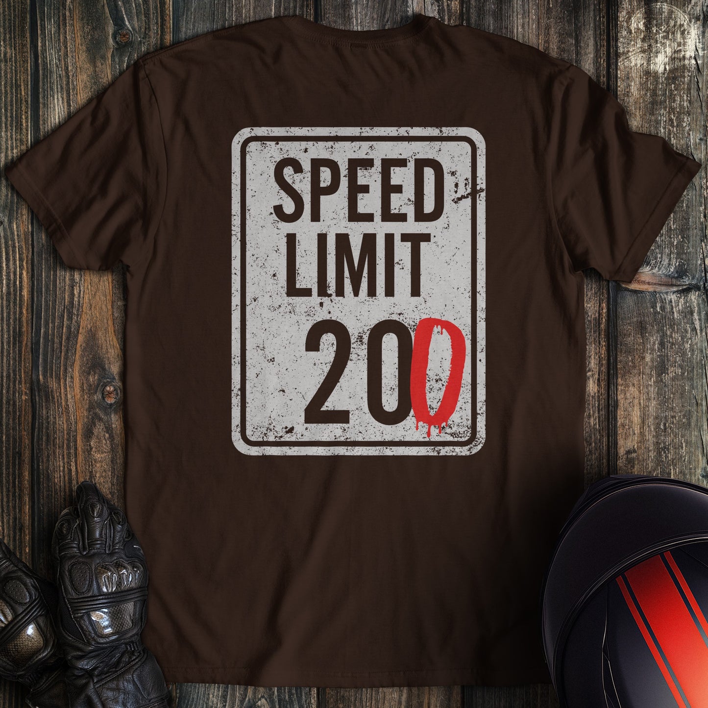 A dark chocolate colored t-shirt with the words "speed limit" printed on the back.