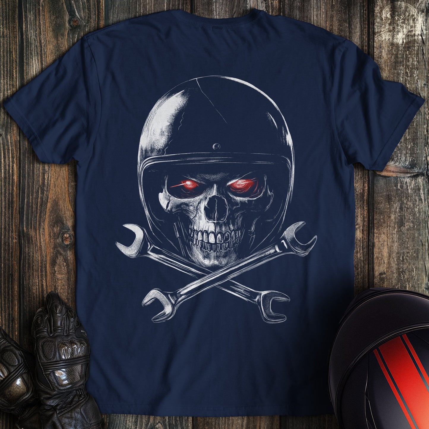 A navy colored t-shirt with the words "skull and wrenches 2" printed on the back.