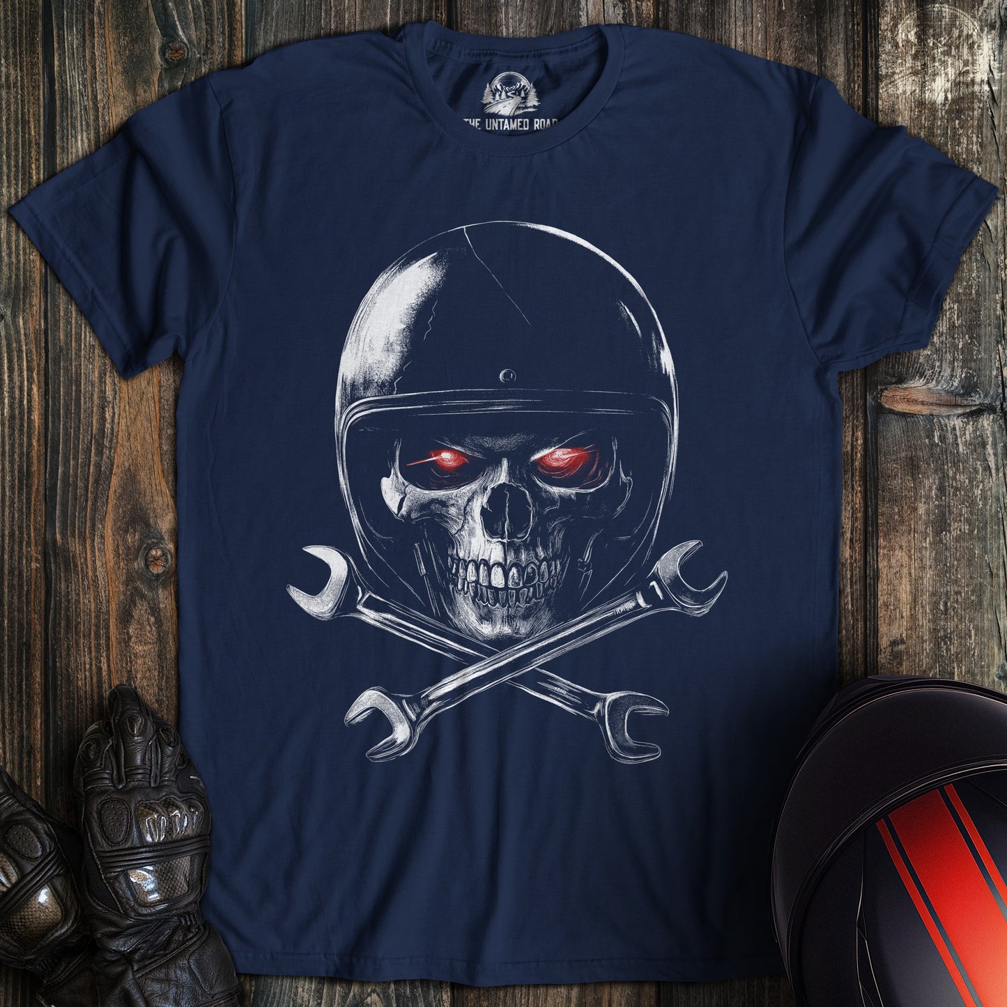 A navy colored t-shirt with the words "skull and wrenches 2" printed on the front.
