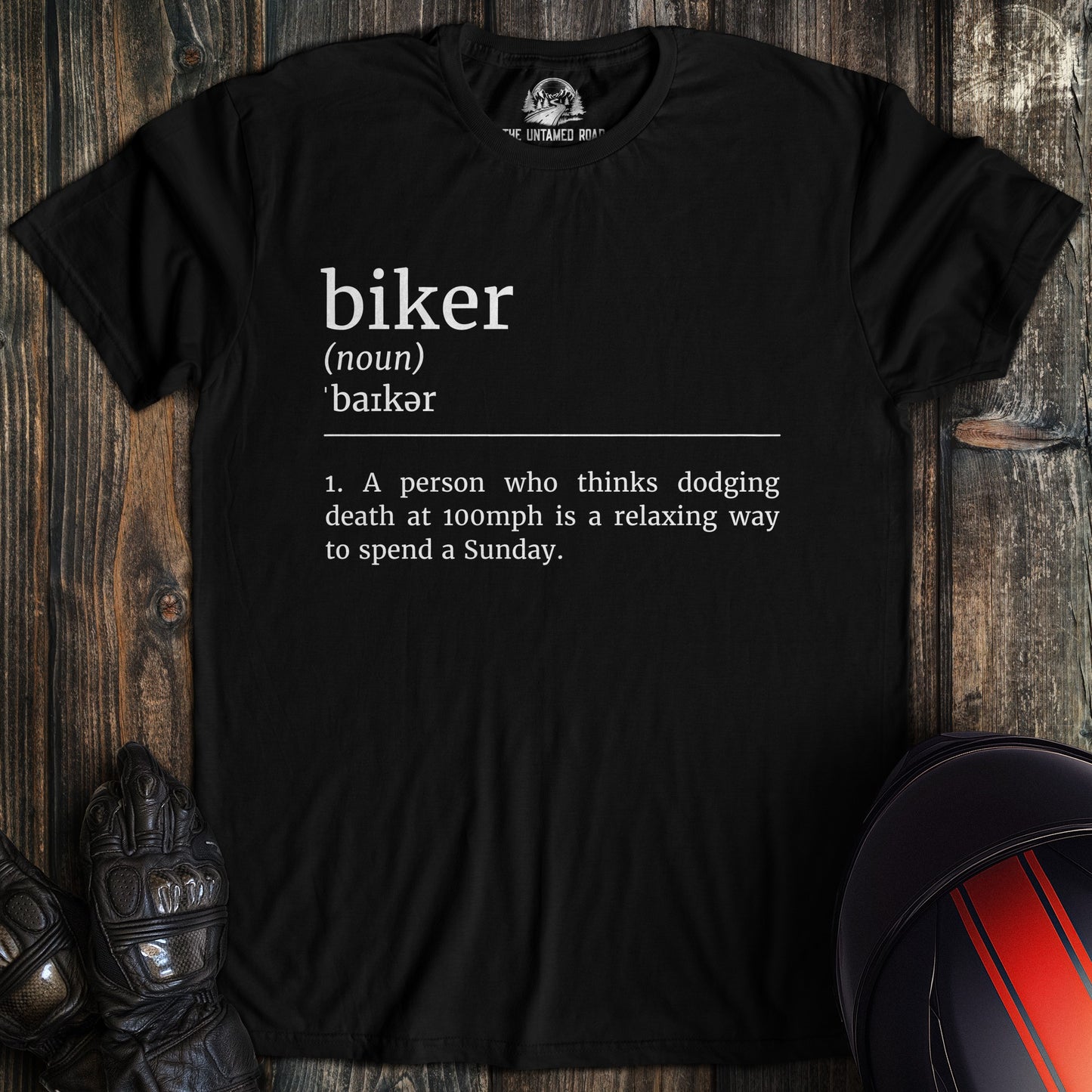 A black colored t-shirt with the words "biker definition 2" printed on the front.