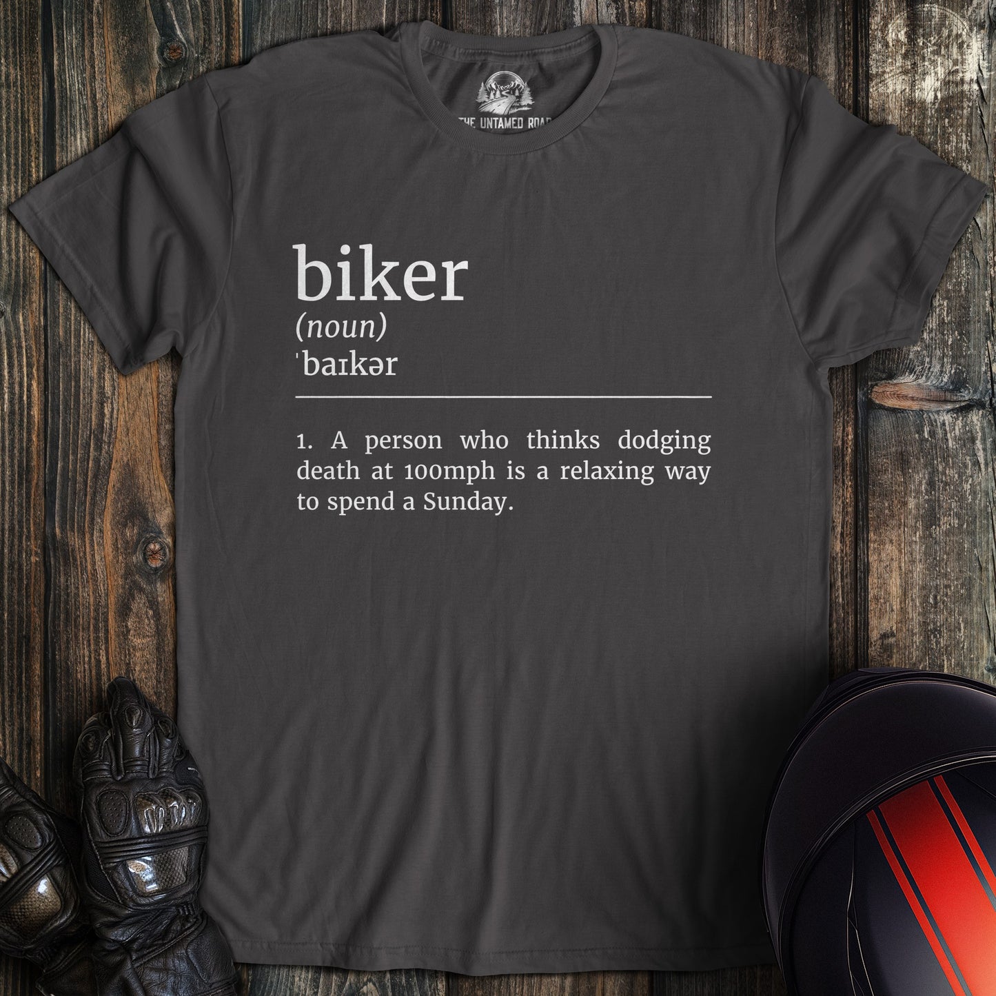 A charcoal colored t-shirt with the words "biker definition 2" printed on the front.