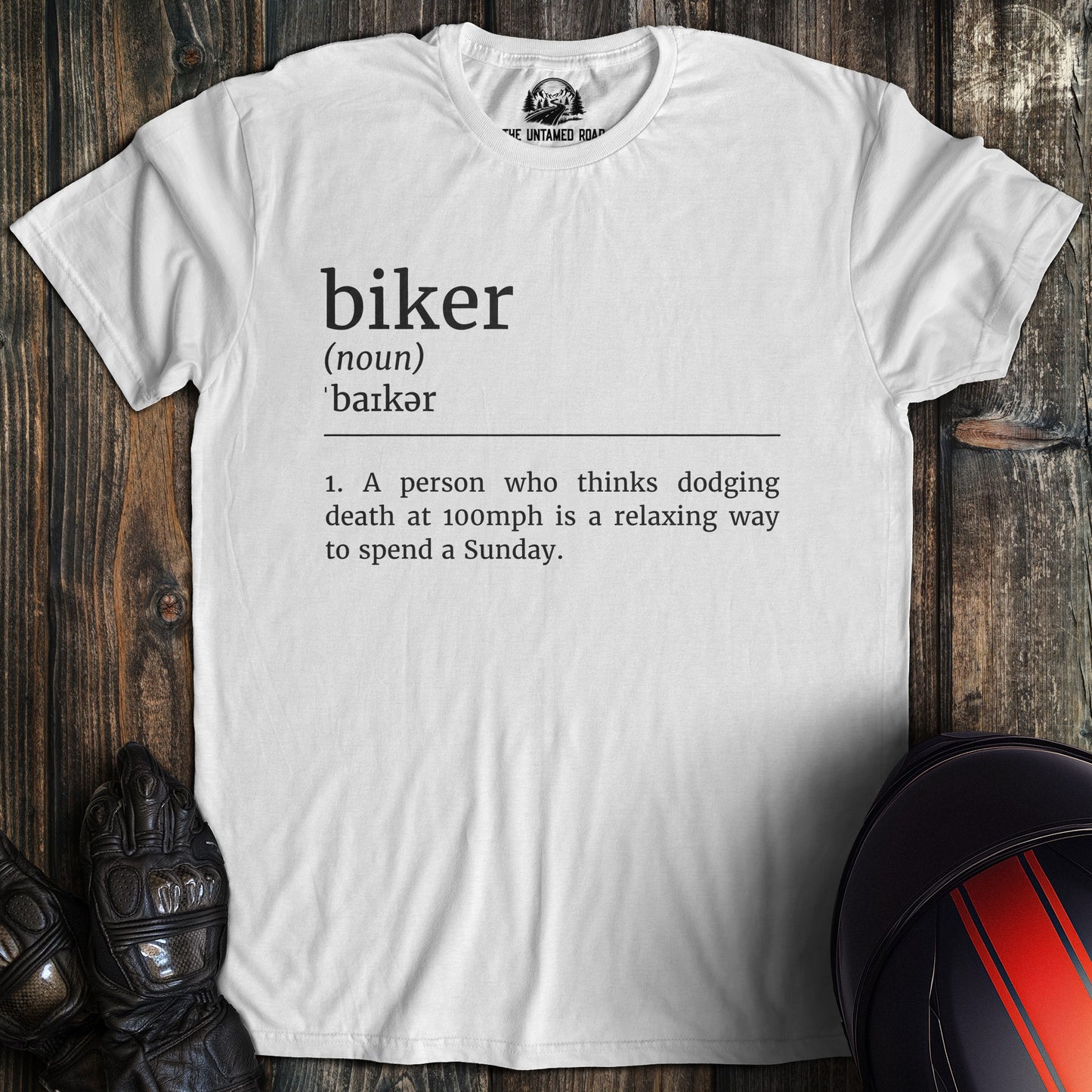 A white colored t-shirt with the words "biker definition 2" printed on the front.