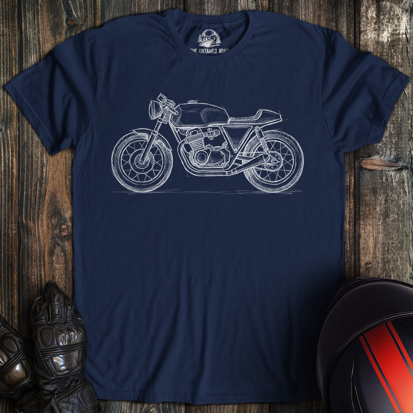 A navy colored t-shirt with the words "cafe racer sketch" printed on the front.