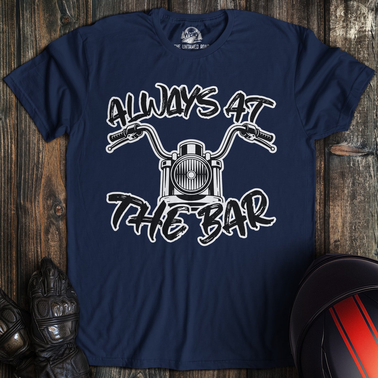 Navy blue t-shirt with a motorcycle handlebar graphic and the text Always At The Bar in a white distressed font.