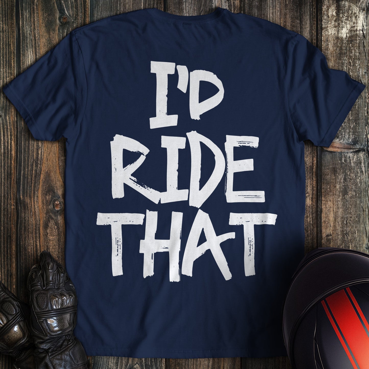 A navy blue t-shirt featuring the phrase I'D RIDE THAT in large, white, distressed brush-stroke lettering.
