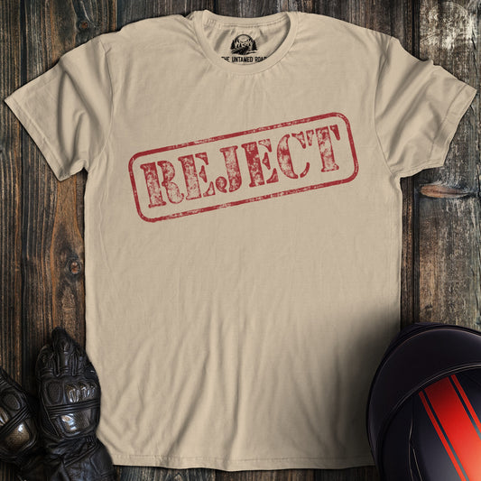 A sand colored t-shirt with the words "reject" printed on the front.