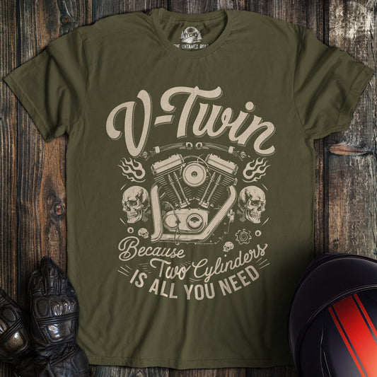 A military green colored t-shirt with the words "two cylinders all you need" printed on the front.