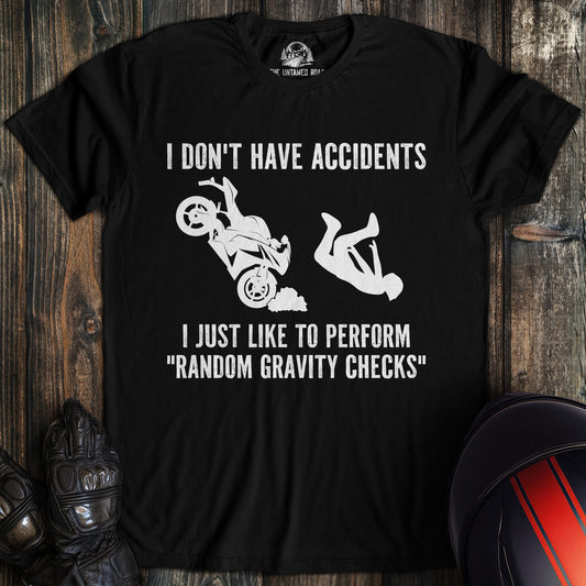 A black colored t-shirt with the words "random gravity checks" printed on the front.