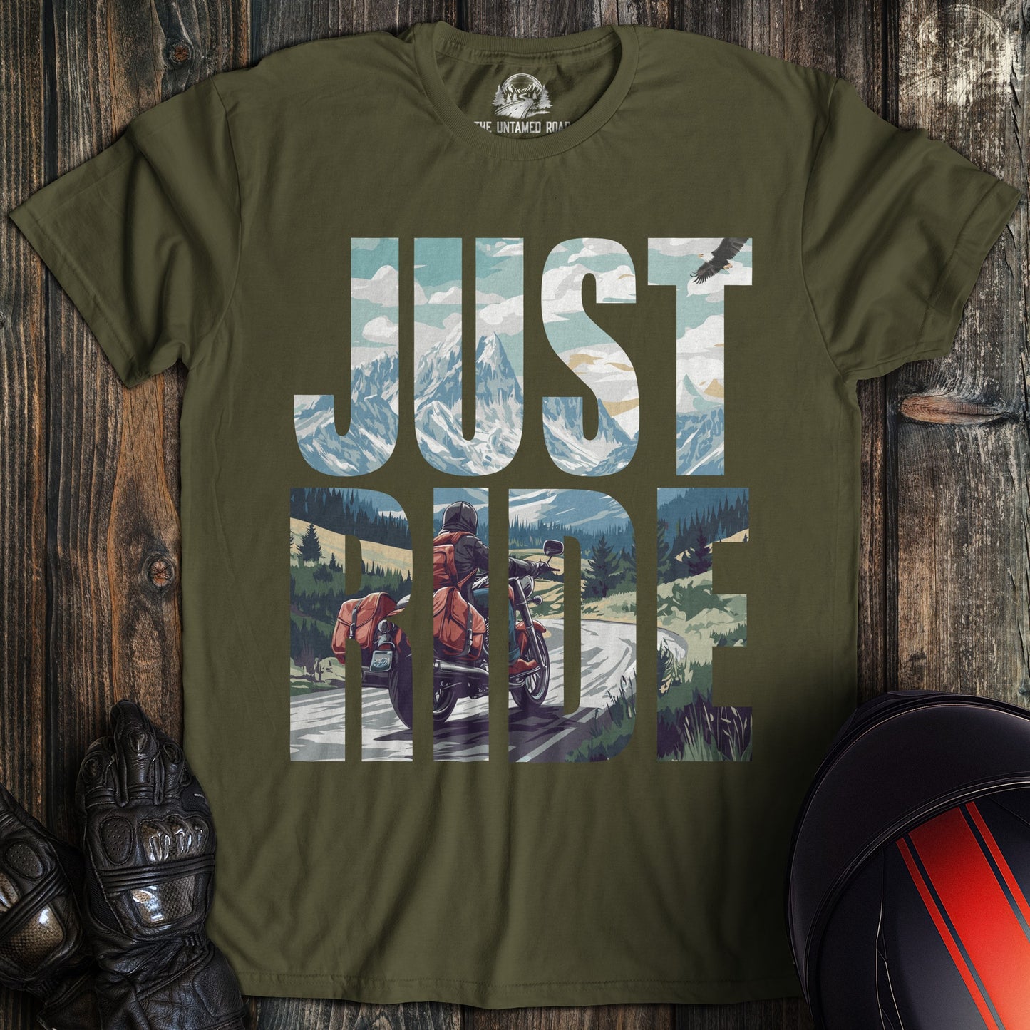 A military green colored t-shirt with the words "just ride" printed on the front.