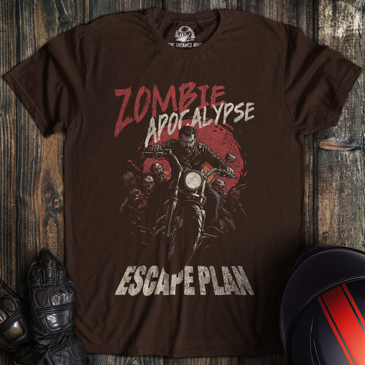 A dark chocolate colored t-shirt with the words "zombie apocalypse" printed on the front.