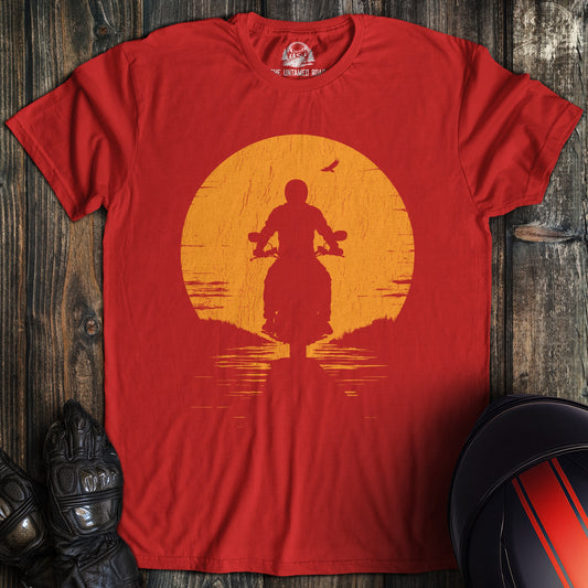 A red colored t-shirt with the words "sunset" printed on the front.