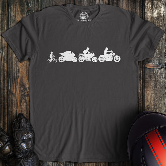A charcoal colored t-shirt with the words "biker evolution" printed on the front.
