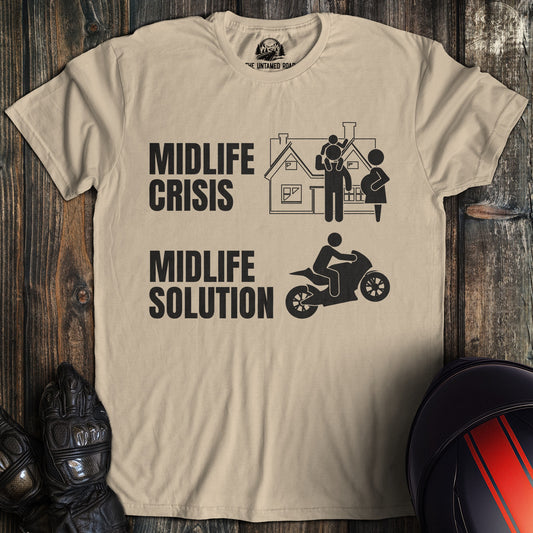 A sand colored t-shirt with the words "midlife crisis solution" printed on the front.