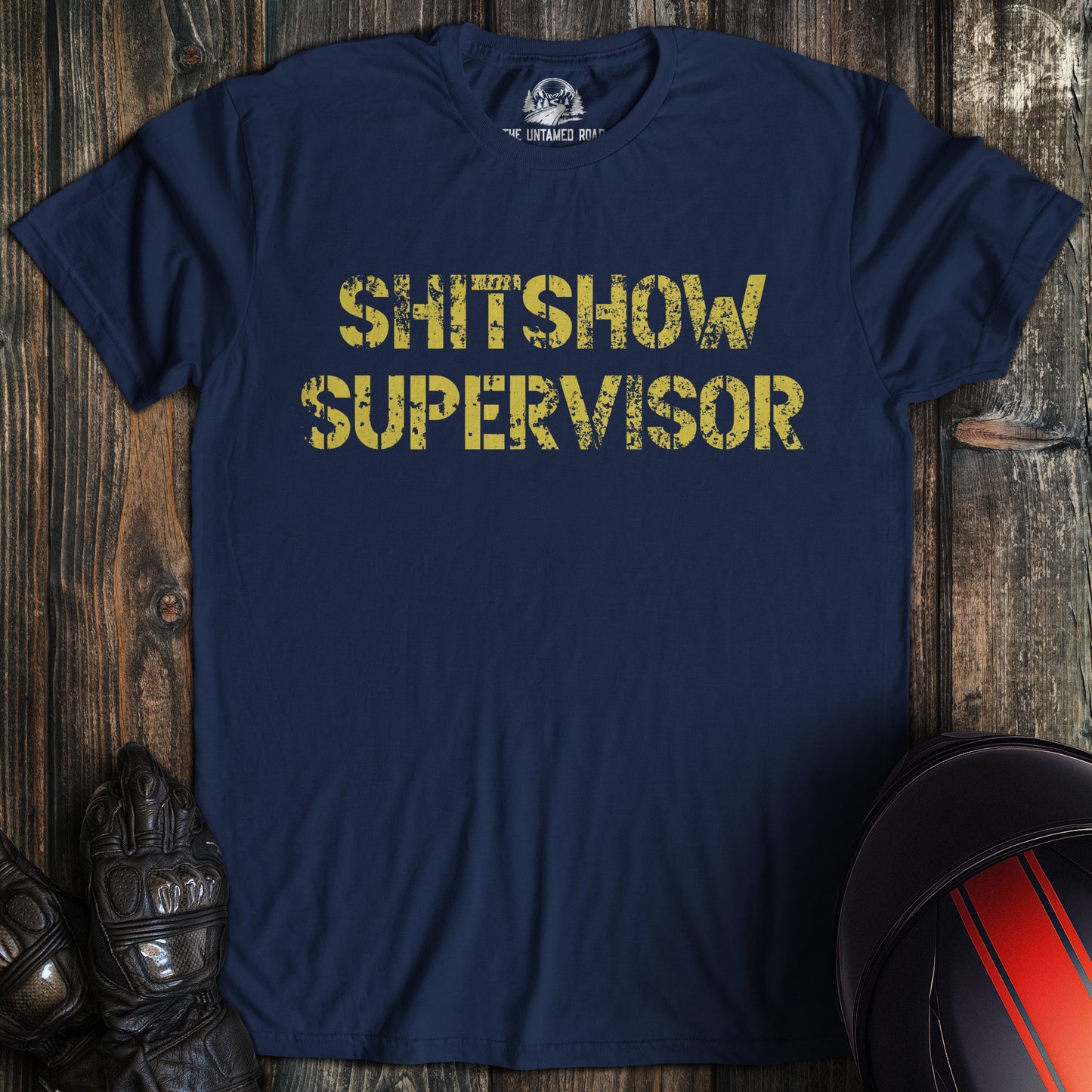 A navy colored t-shirt with the words "shitshow supervisor" printed on the front.