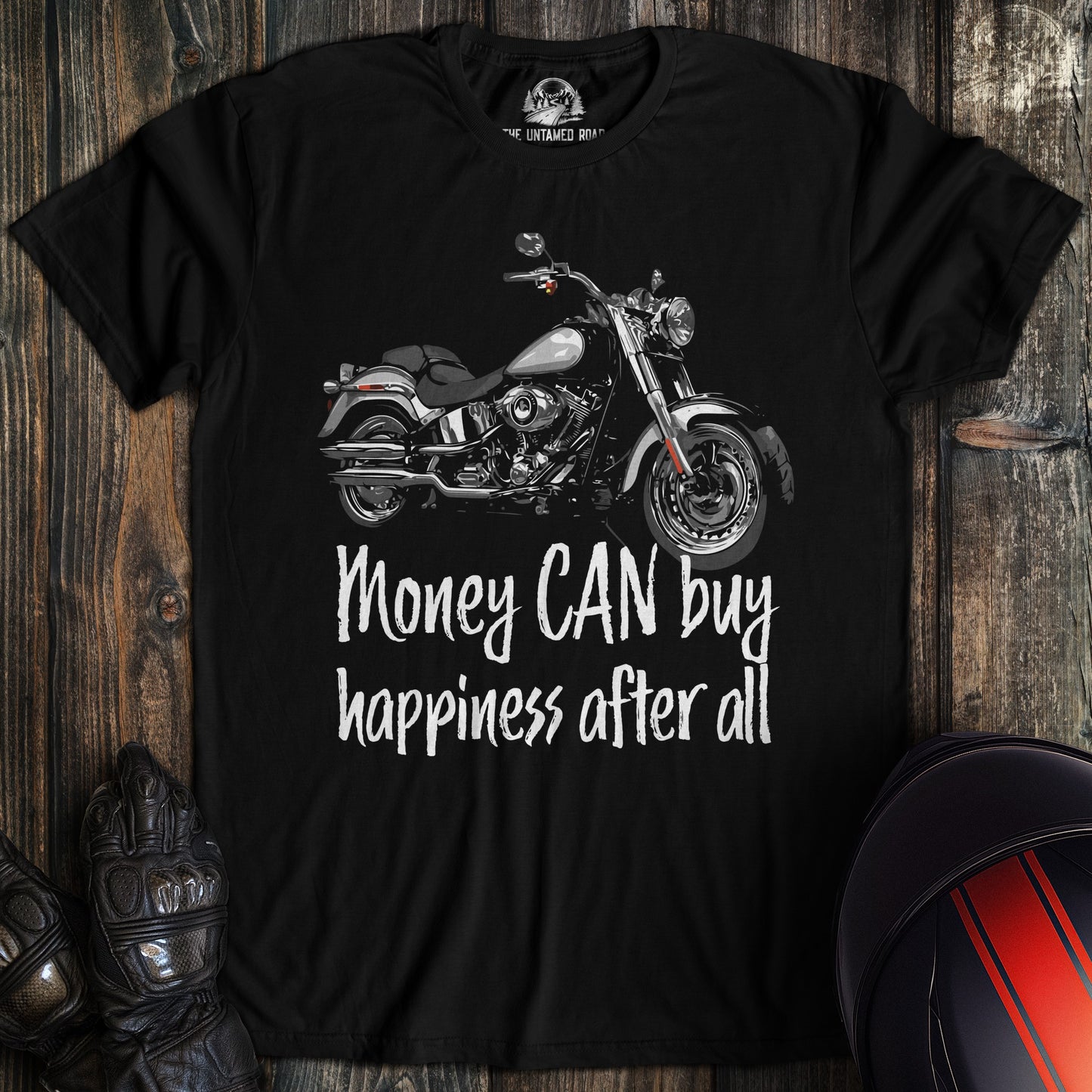A black colored t-shirt with the words "money can buy happiness" printed on the front.