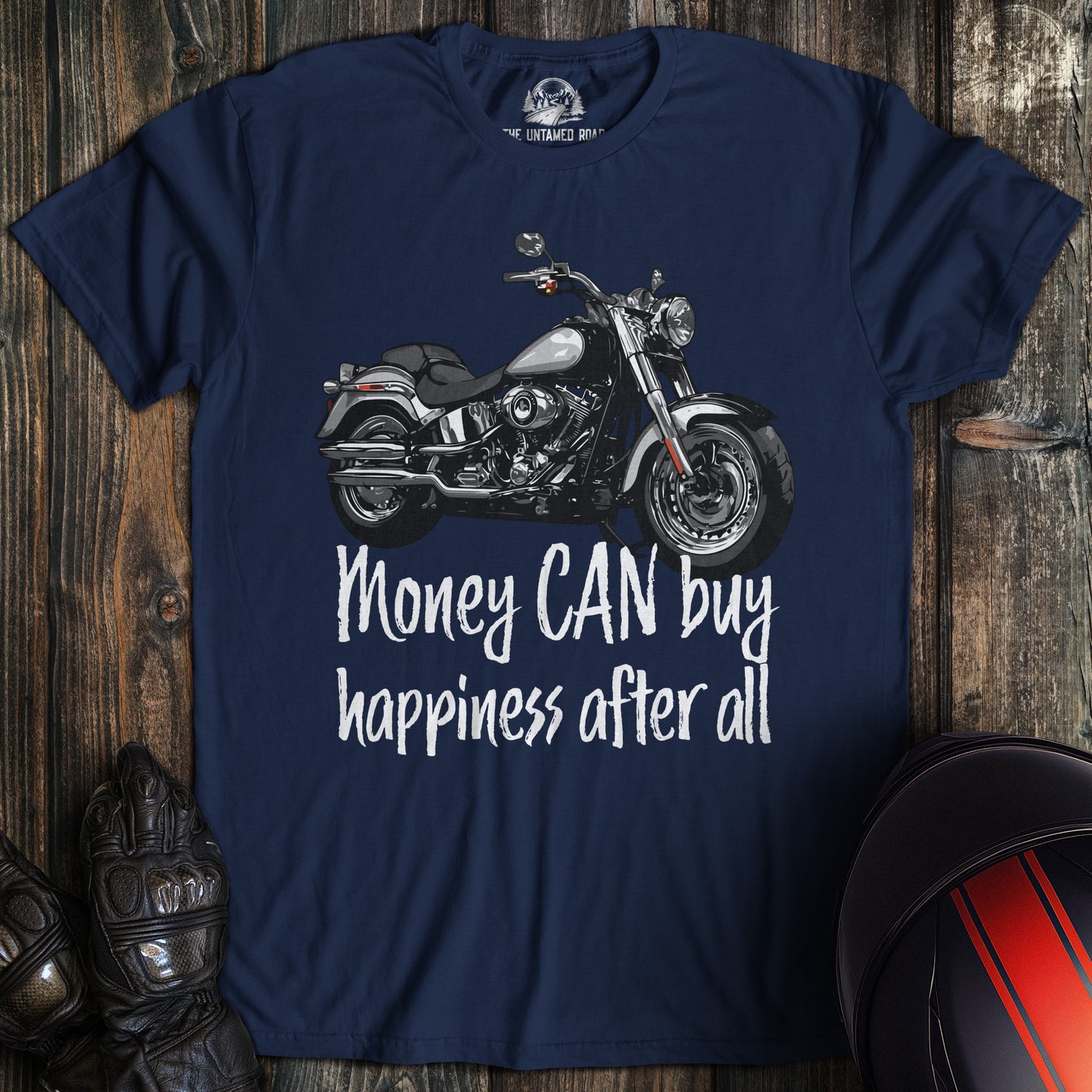A navy colored t-shirt with the words "money can buy happiness" printed on the front.