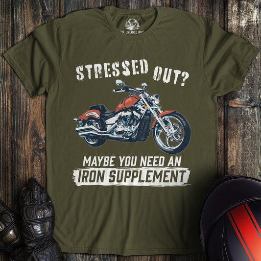 A military green colored t-shirt with the words "iron supplement" printed on the front.