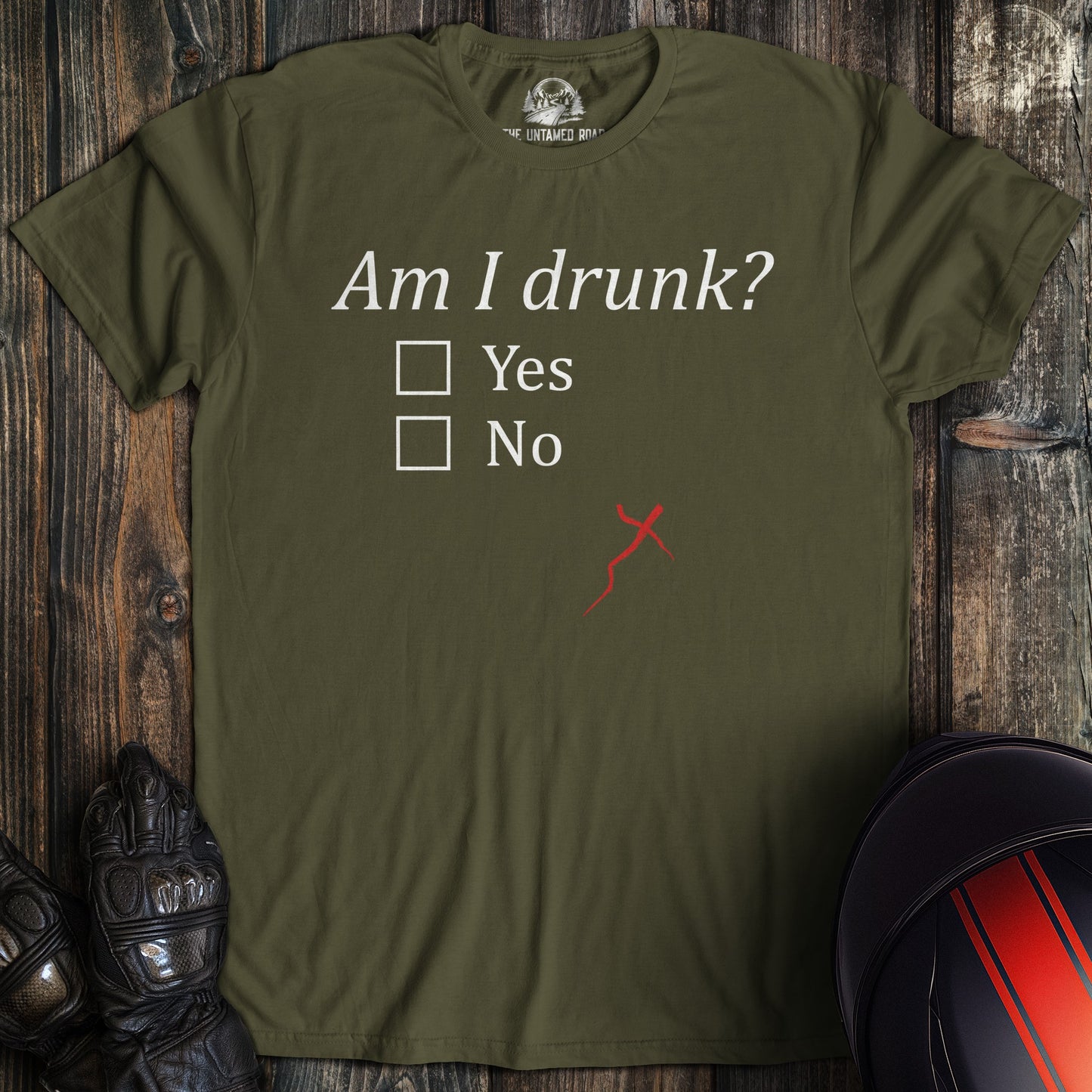 A military green colored t-shirt with the words "my riding scares me too" printed on the front.