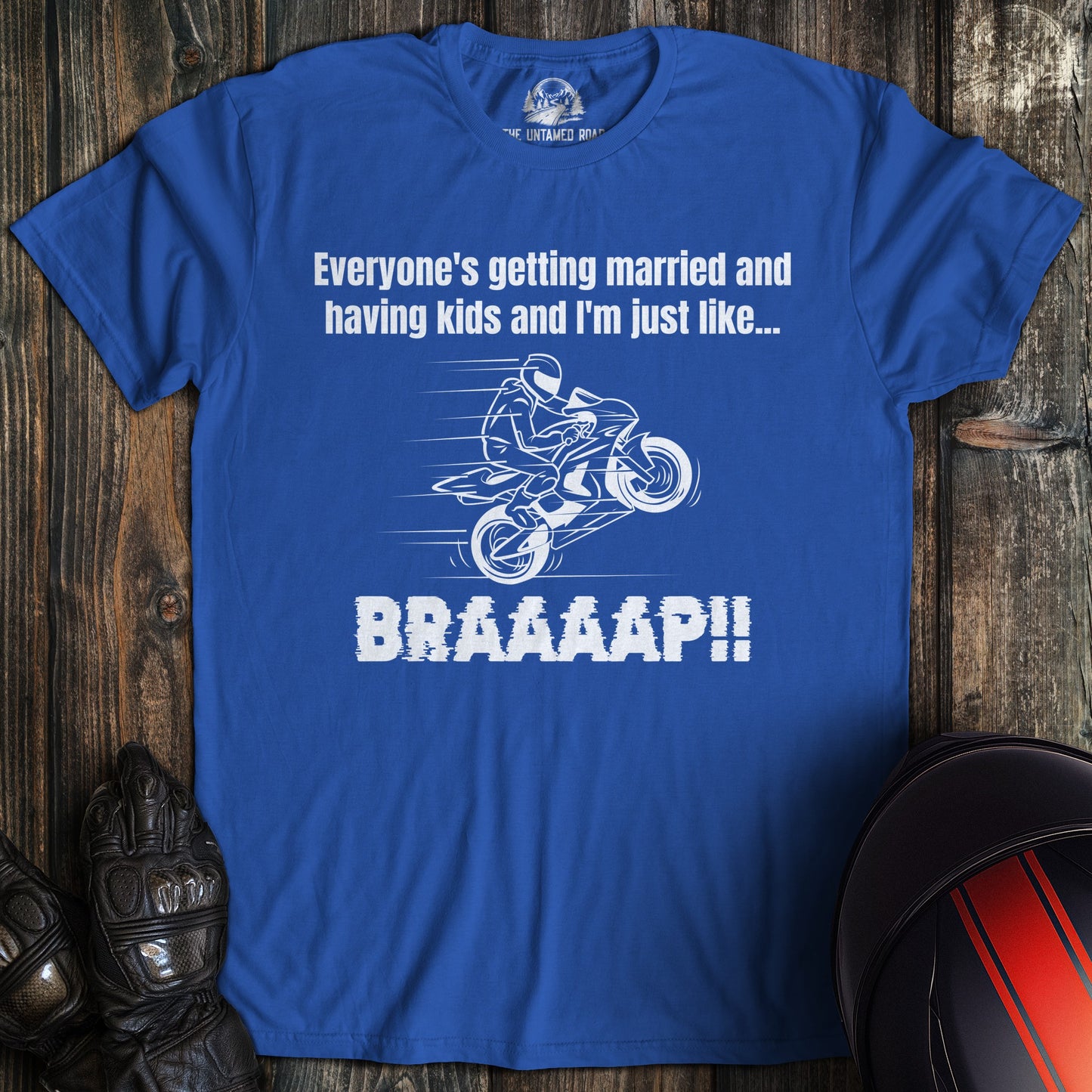 A royal blue colored t-shirt with the words "just like braaap" printed on the front.