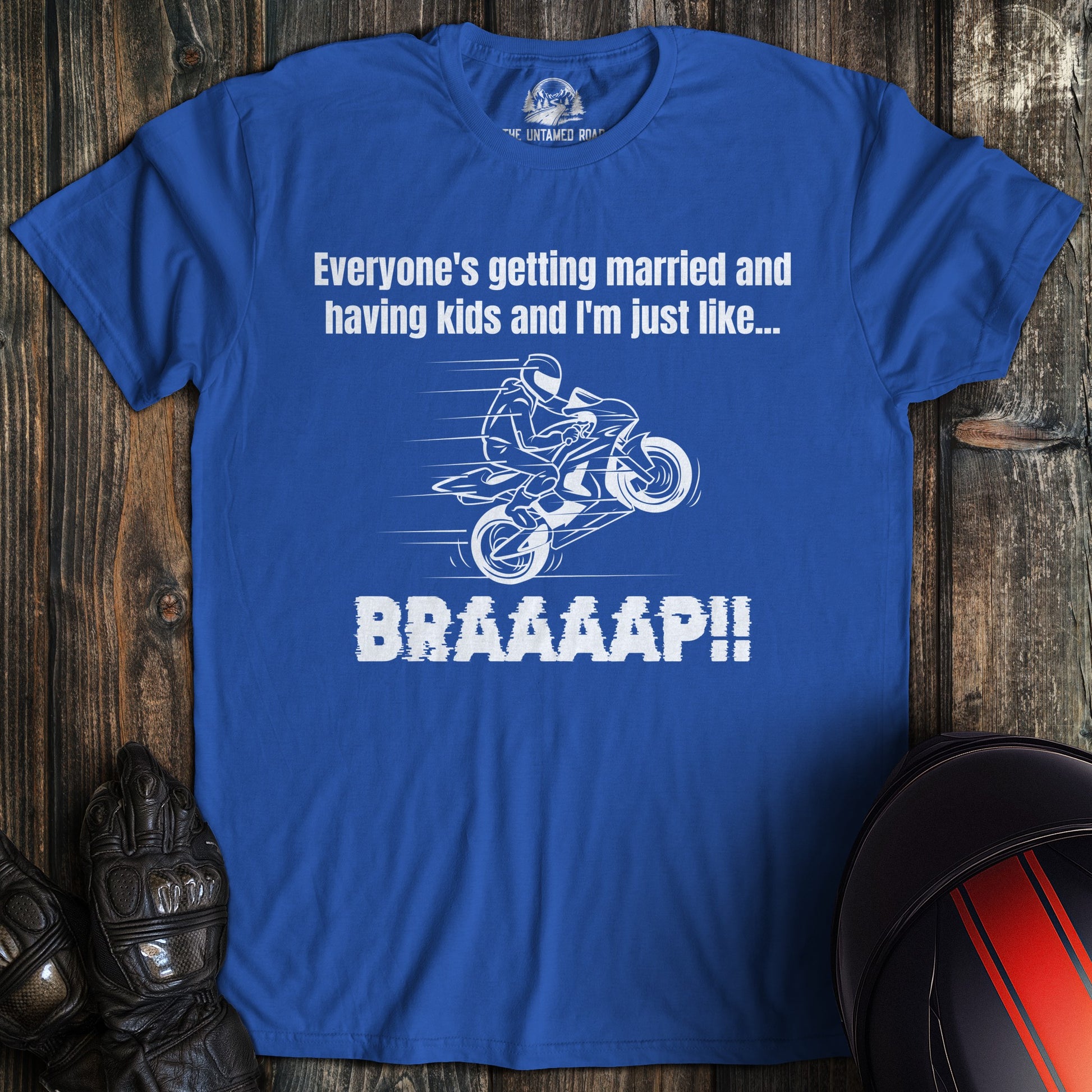A royal blue colored t-shirt with the words "just like braaap" printed on the front.