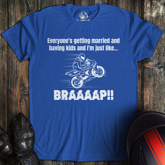 A royal blue colored t-shirt with the words "just like braaap" printed on the front.