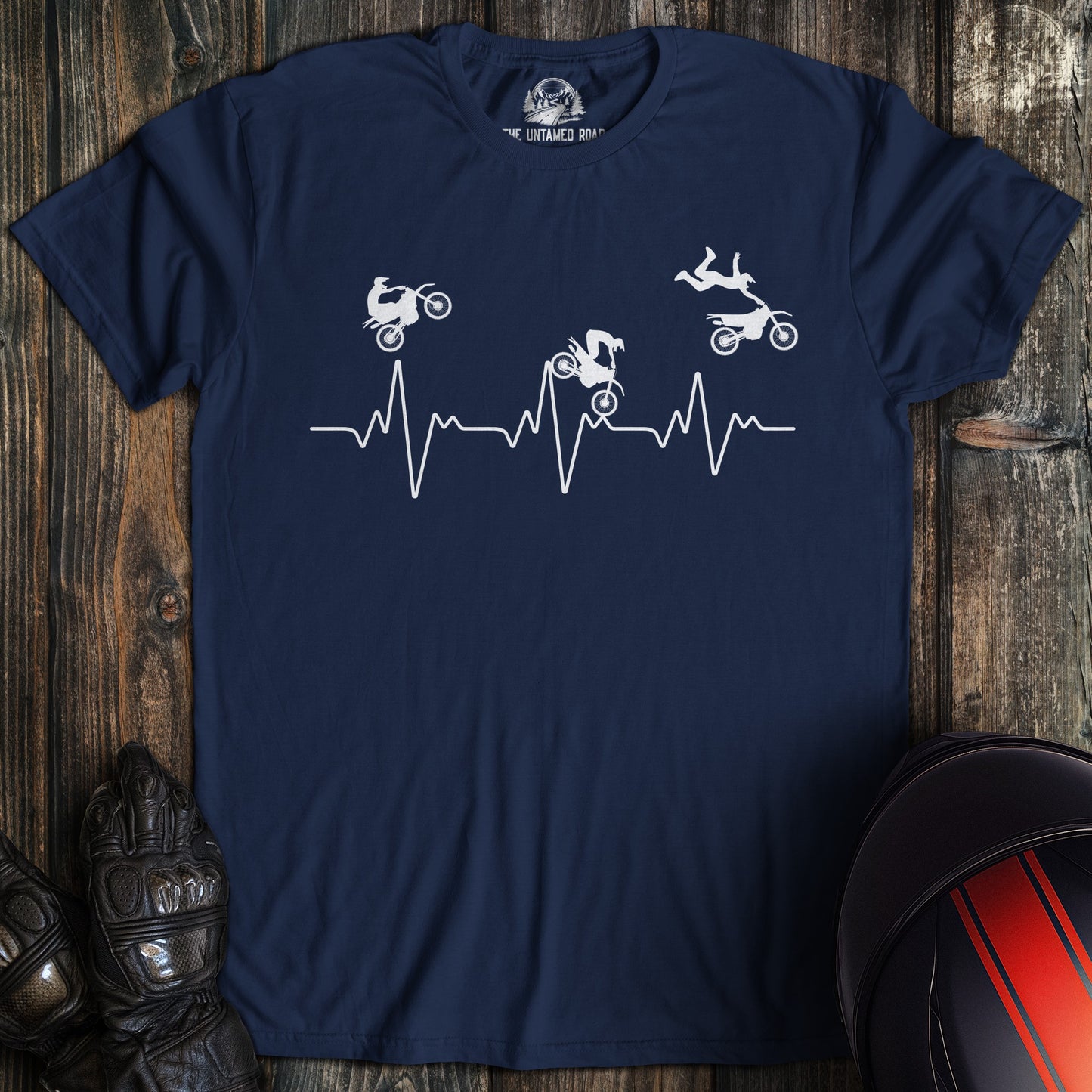 A navy colored t-shirt with the words "dirtbike heartbeat" printed on the front.