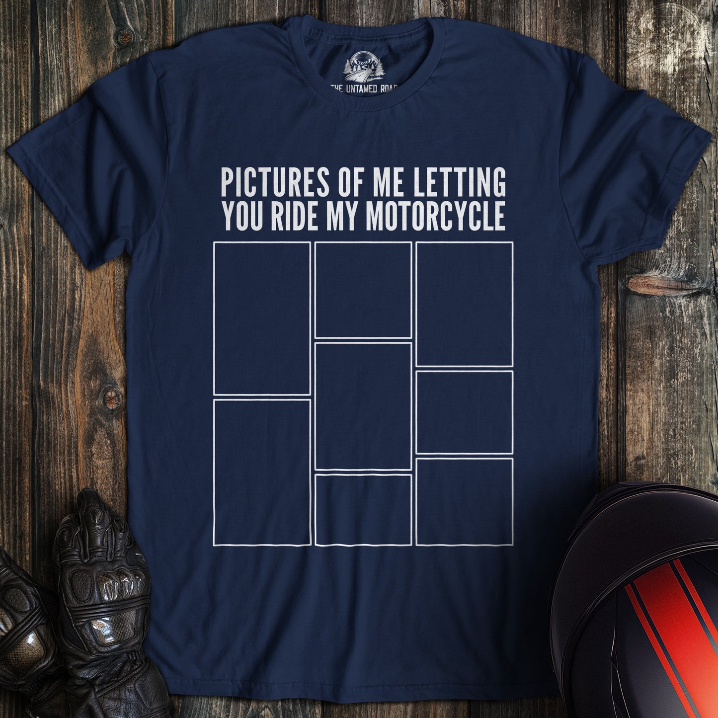 A navy colored t-shirt with the words "letting you ride" printed on the front.
