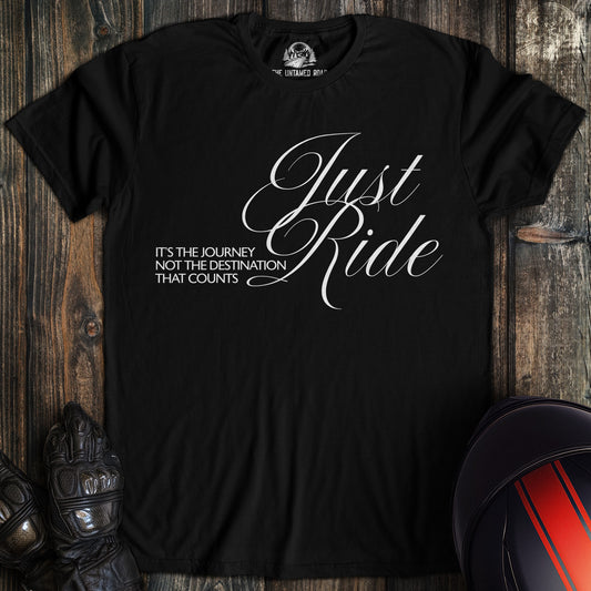 A black colored t-shirt with the words "journey not destination" printed on the front.