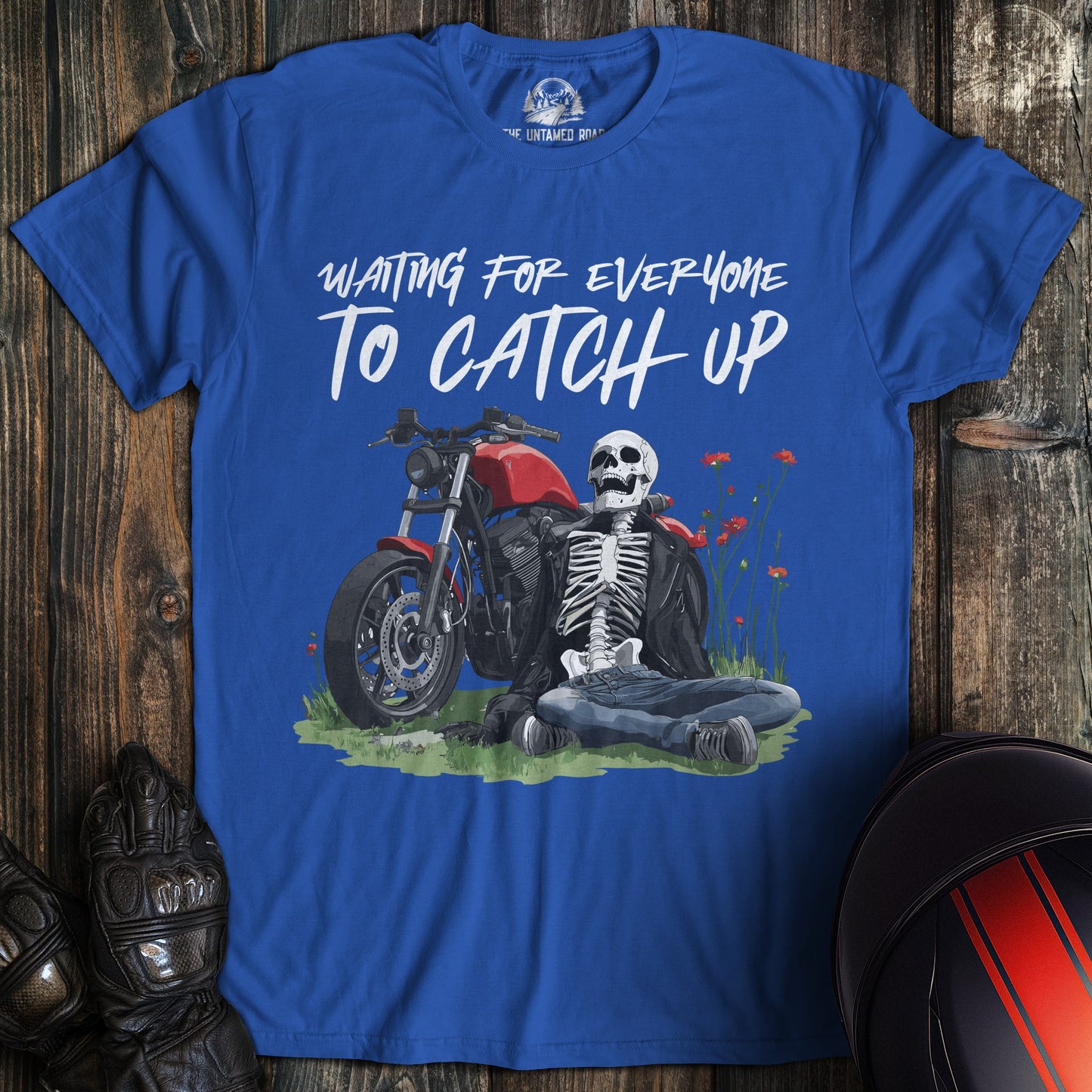 A royal blue colored t-shirt with the words "waiting for everyone" printed on the front.