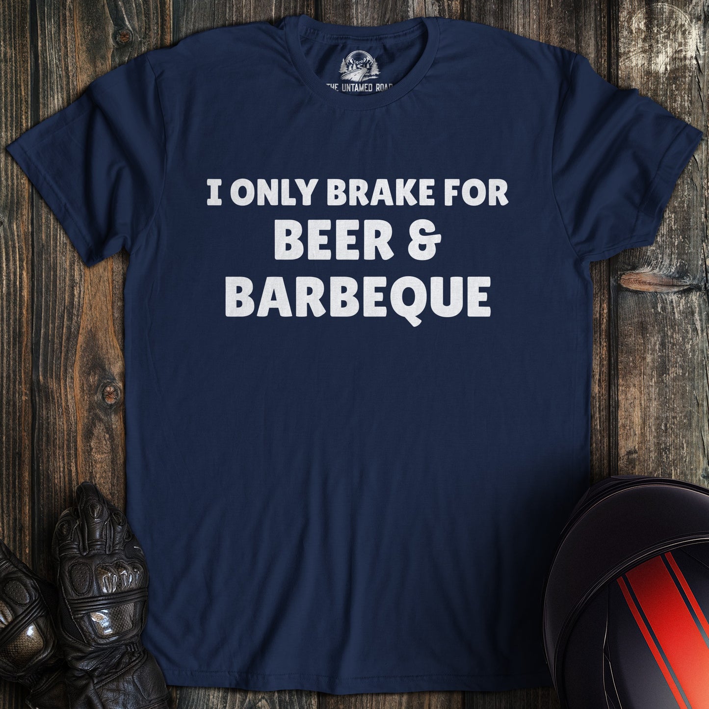 A navy colored t-shirt with the words "brake for beer and bbq" printed on the front.