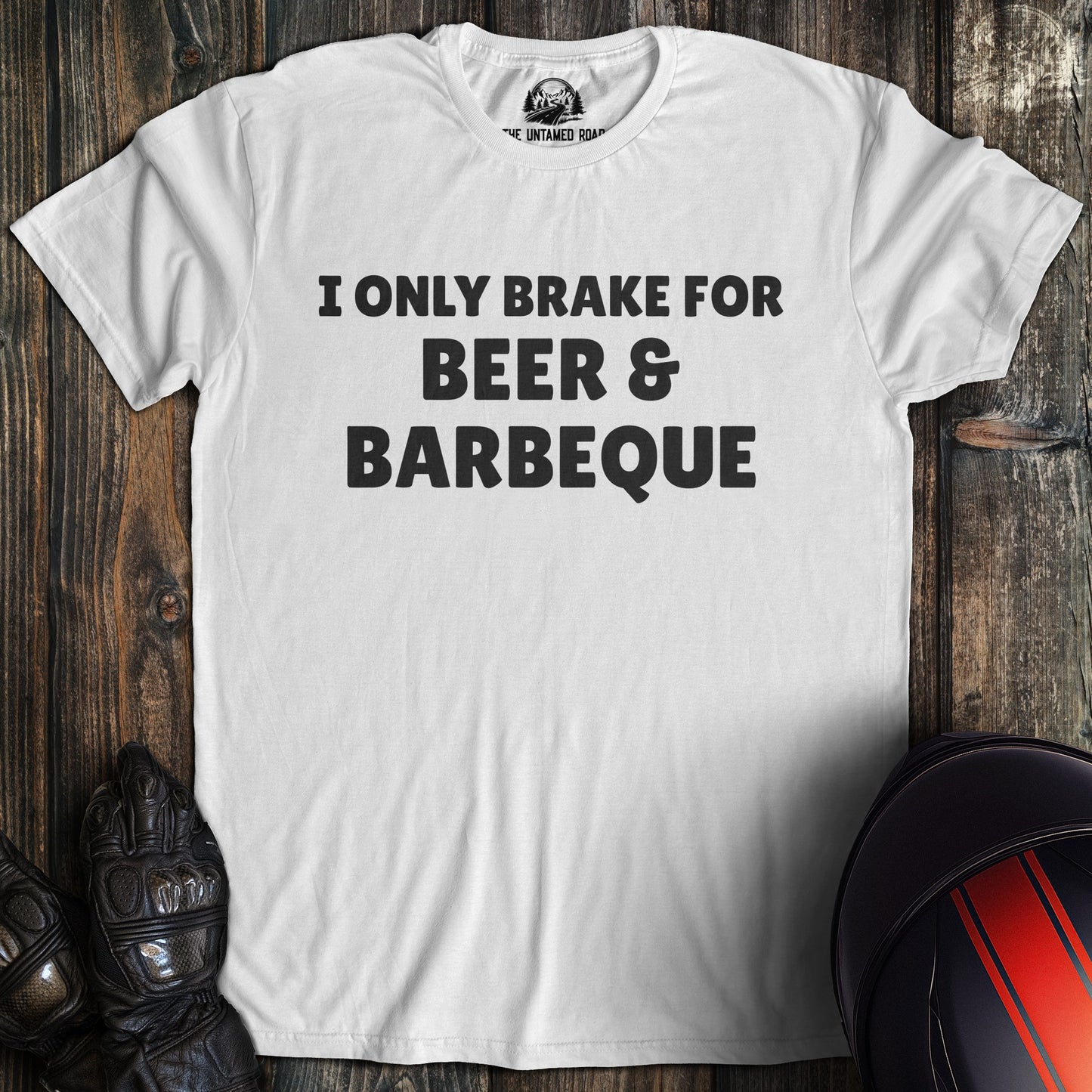 A white colored t-shirt with the words "brake for beer and bbq" printed on the front.