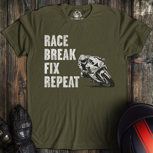 A military green colored t-shirt with the words "race break fix" printed on the front.