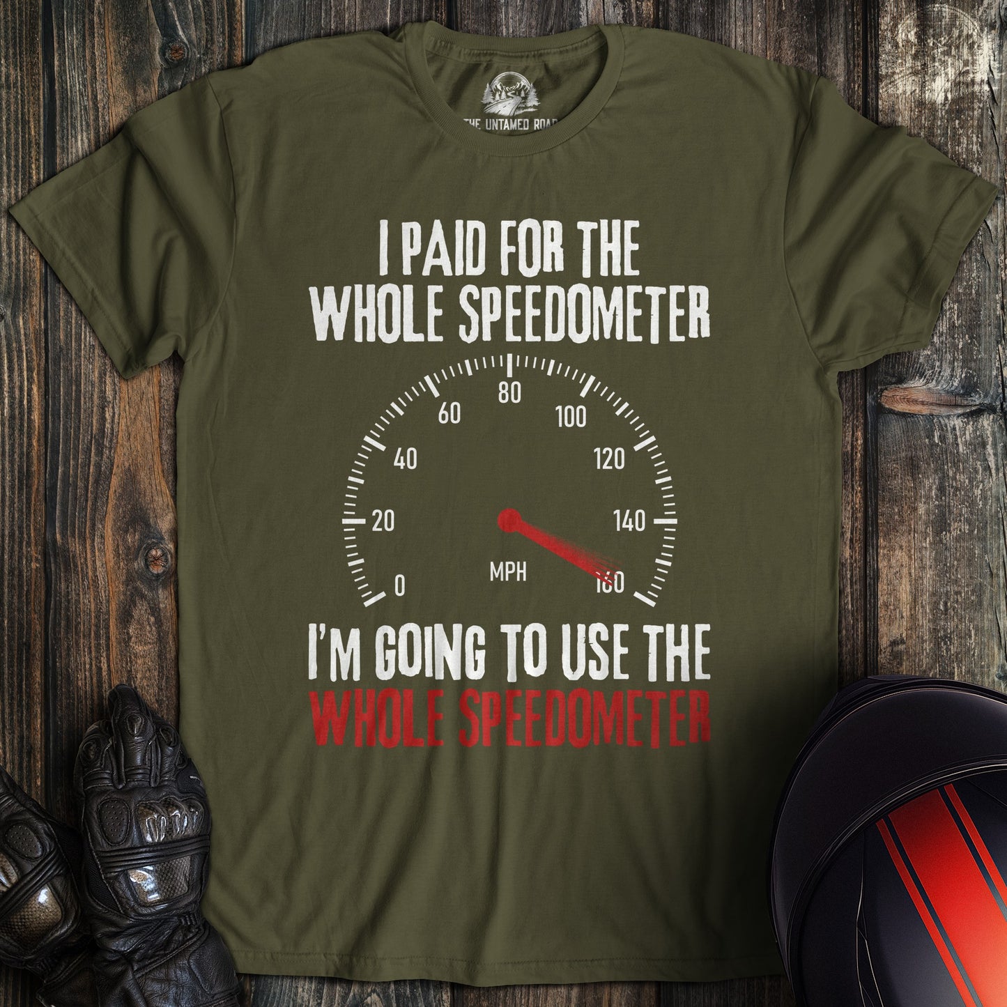 A military green t-shirt featuring a speedometer graphic and the funny biker quote, I Paid For The Whole Speedometer.
