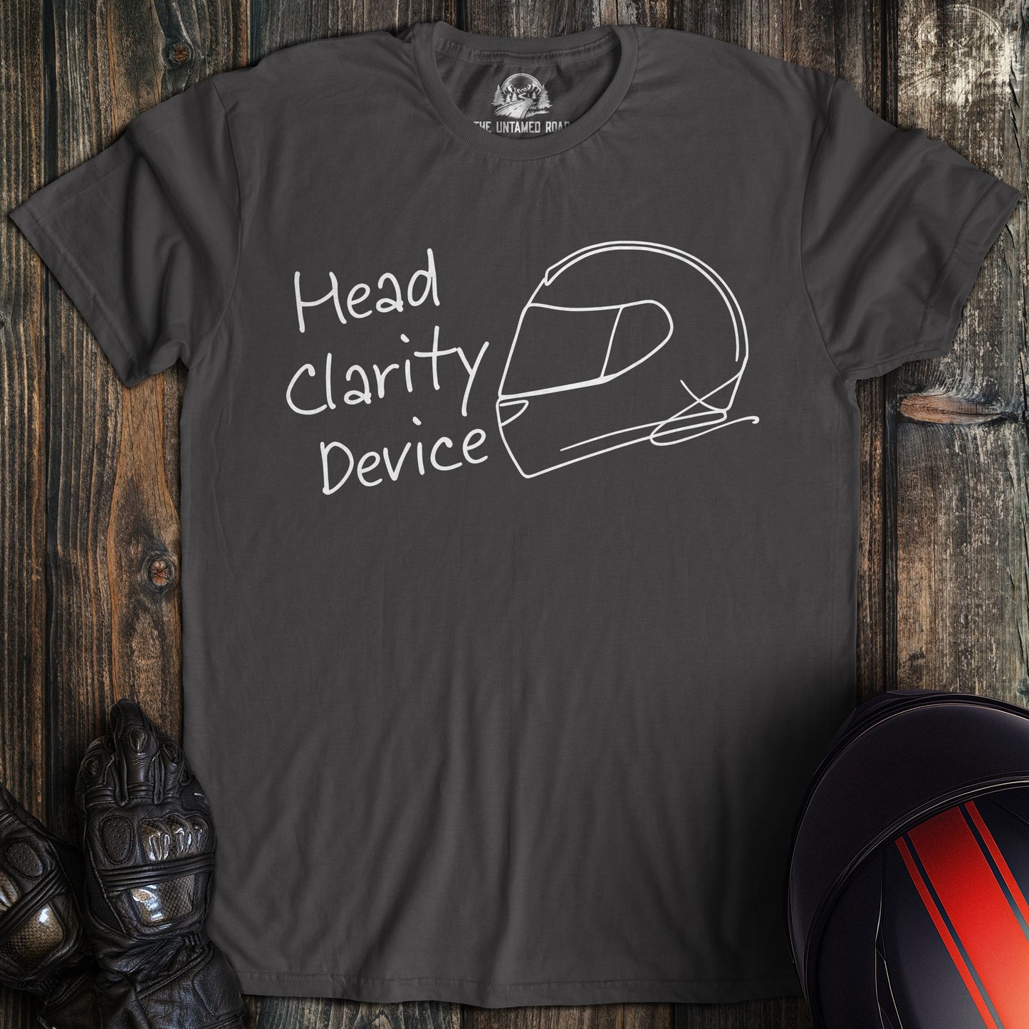 A charcoal gray t-shirt featuring a white line drawing of a motorcycle helmet and the text Head Clarity Device.