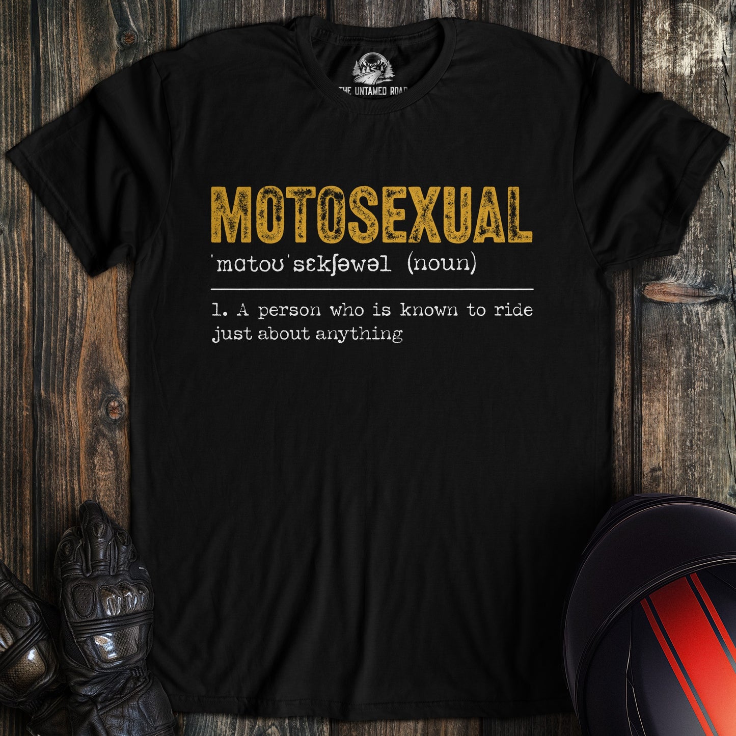 A black t-shirt featuring a funny dictionary definition for 'MOTOSEXUAL' in yellow and white text for a motorcycle biker.