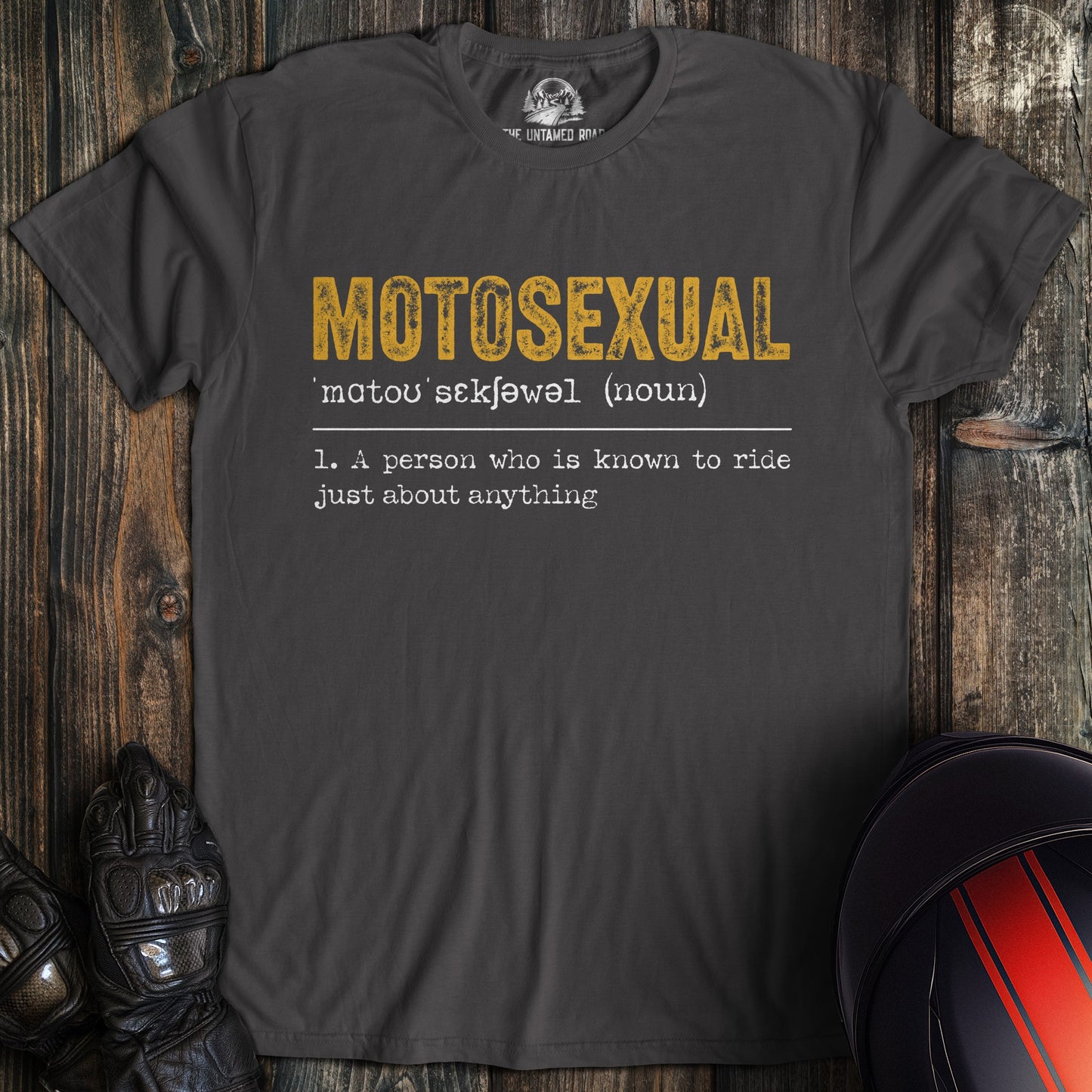 A charcoal gray t-shirt featuring a dictionary-style definition for the word Motosexual in yellow and white text.
