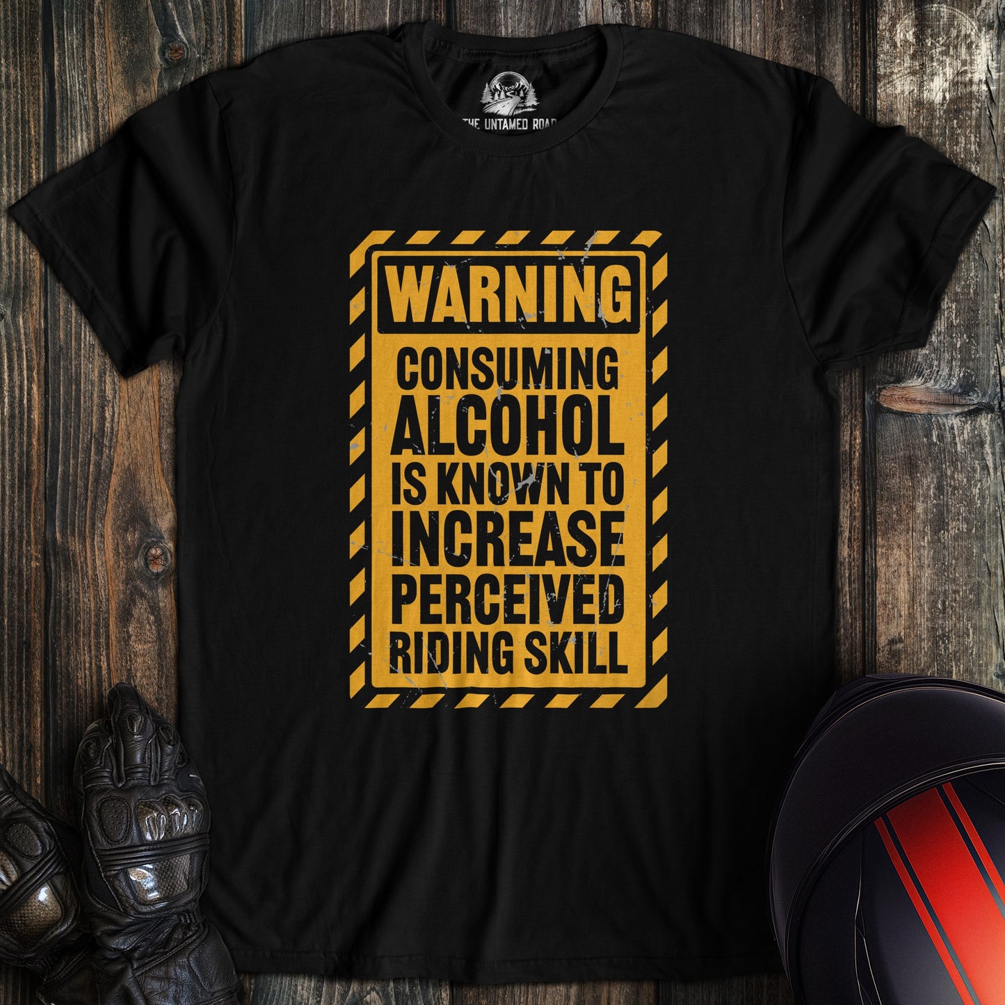 A black colored t-shirt with the words "alcohol riding skill" printed on the front.