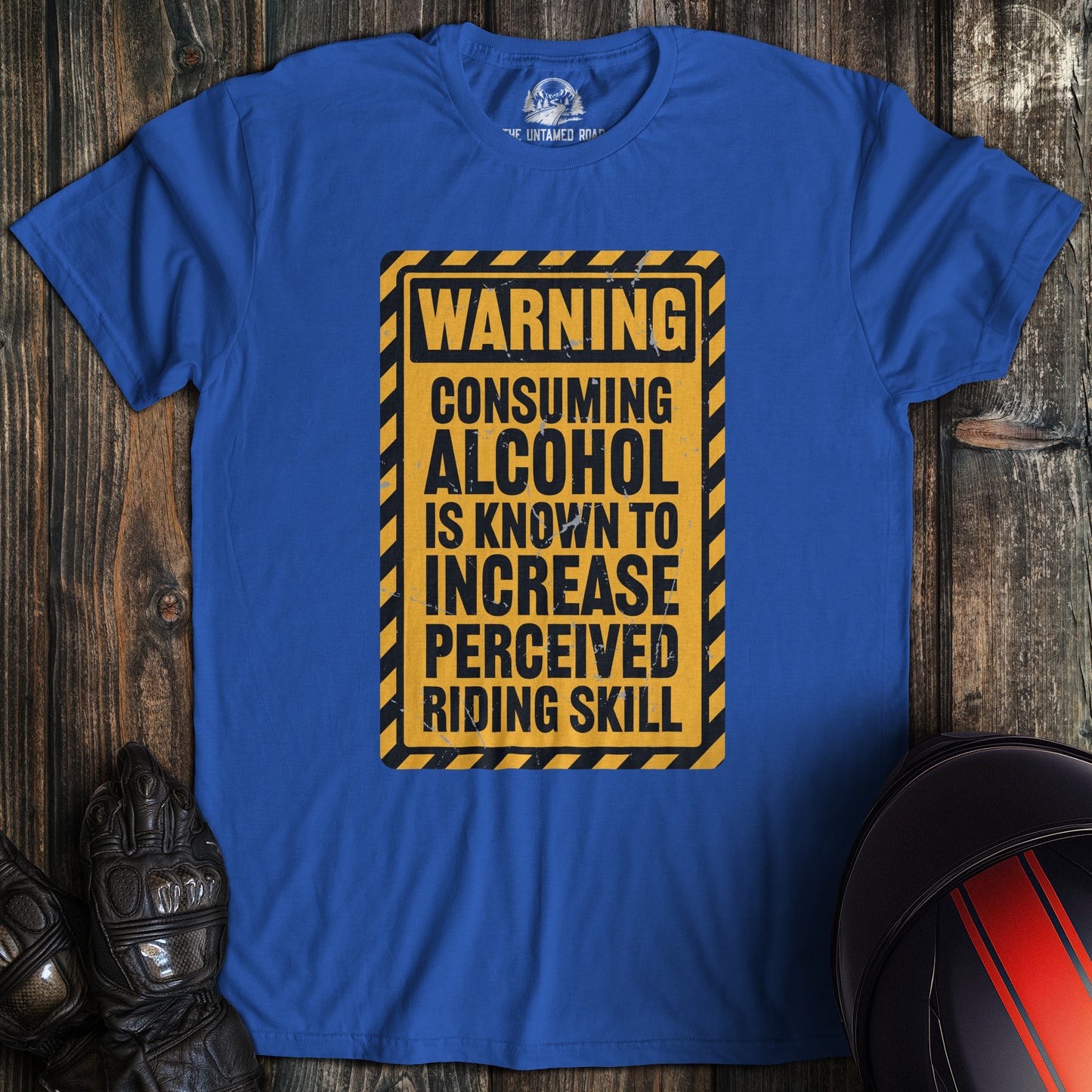 A royal blue colored t-shirt with the words "alcohol riding skill" printed on the front.