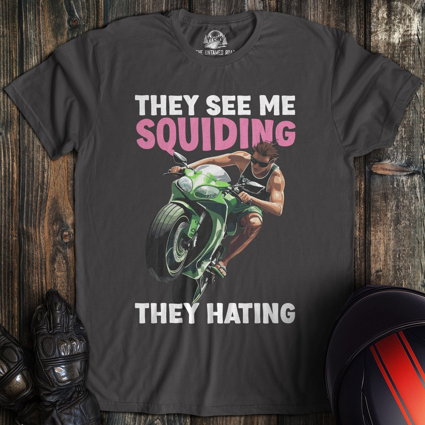 A charcoal colored t-shirt with the words "squidding" printed on the front.