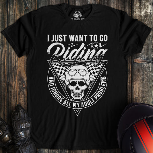A black colored t-shirt with the words "ignore adult problems" printed on the front.