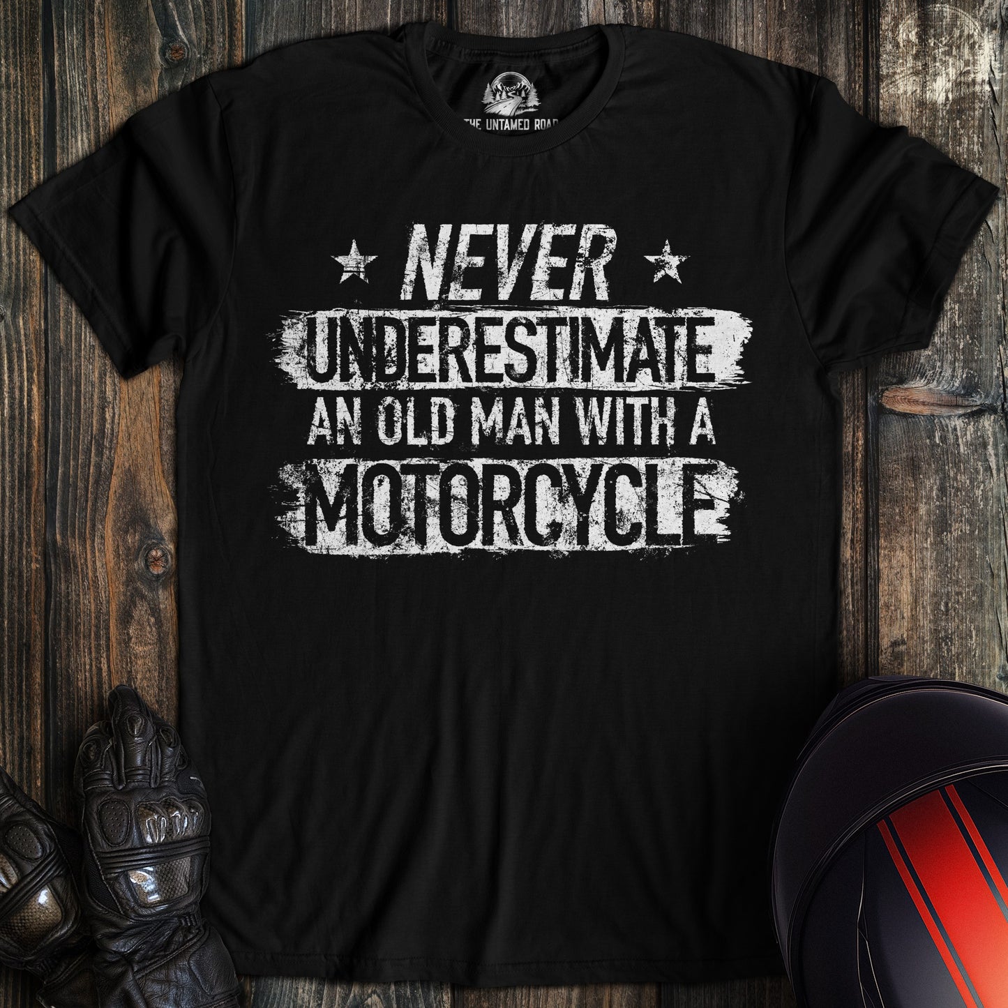 A black colored t-shirt with the words "old man motorcycle" printed on the front.